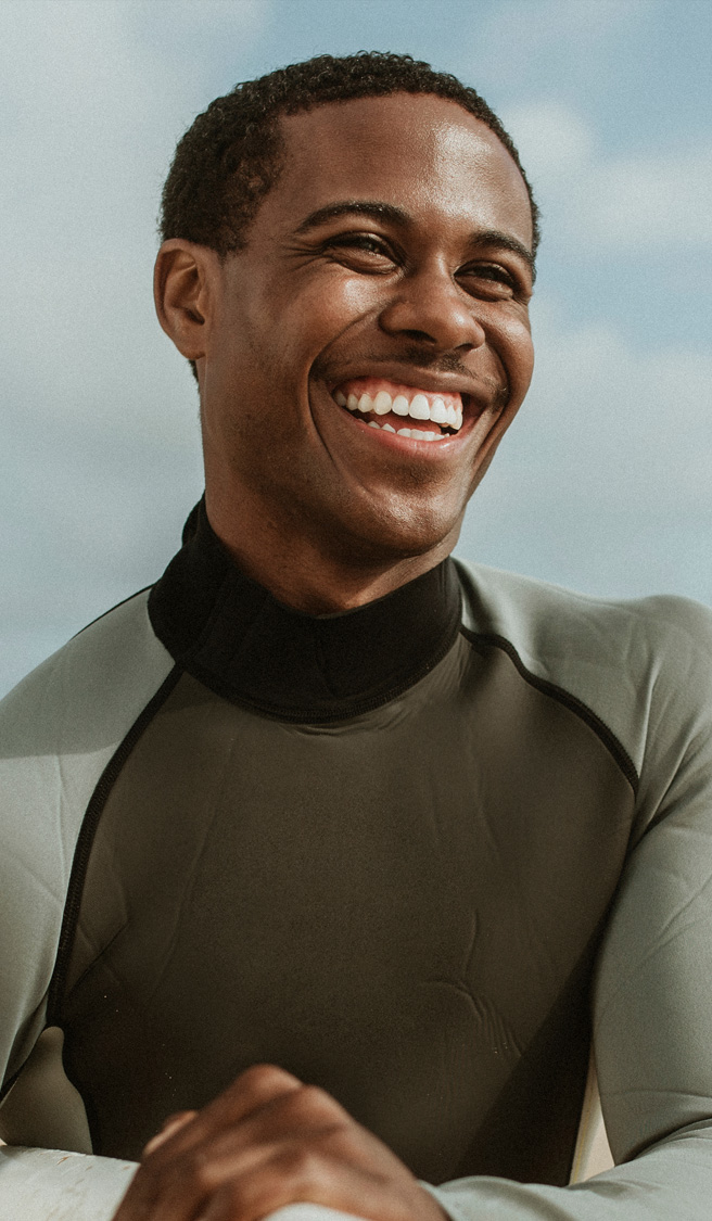 Smiling male surfer Smiling male surfer