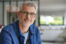 Middle-aged guy with eyeglasses and blue shirt