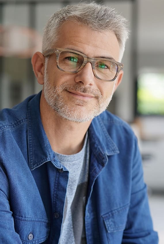 Middle-aged guy with eyeglasses and blue shirt