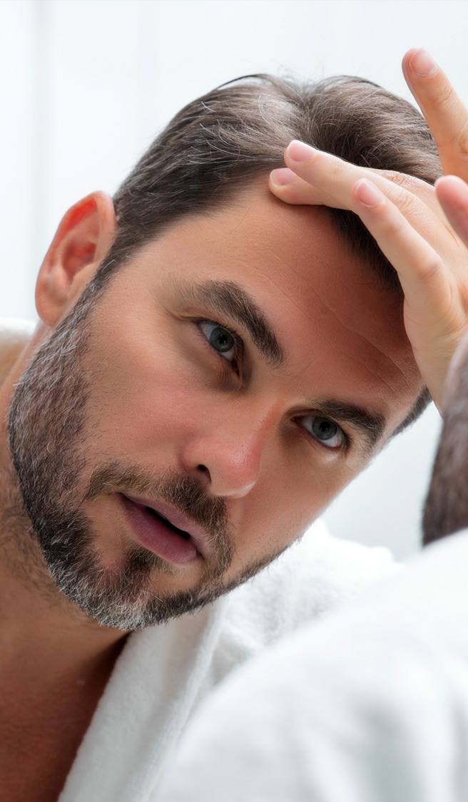 Mens beauty cosmetics, male beauty and skincare. Morning healthcare and hygiene for man. Perfect beauty skin. Handsome millennial man after shower apply nourishing facial cream or mask on skin.
