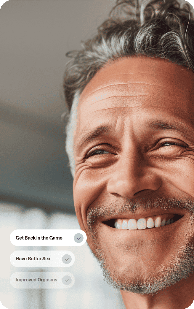 Older man smiling with facial hair